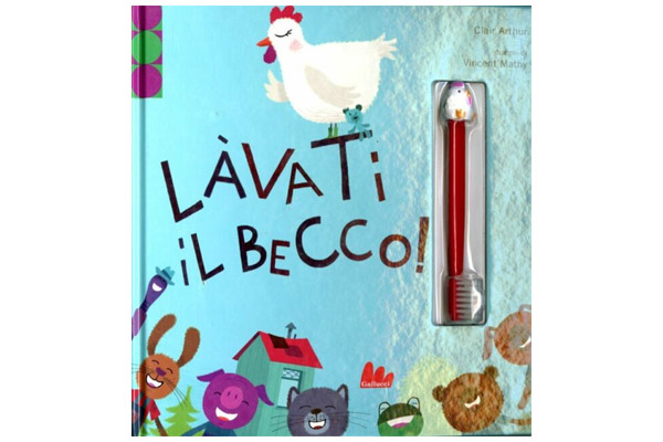 foto della copertina del libro, in cui si vede lo spazzolino da denti in omaggio
